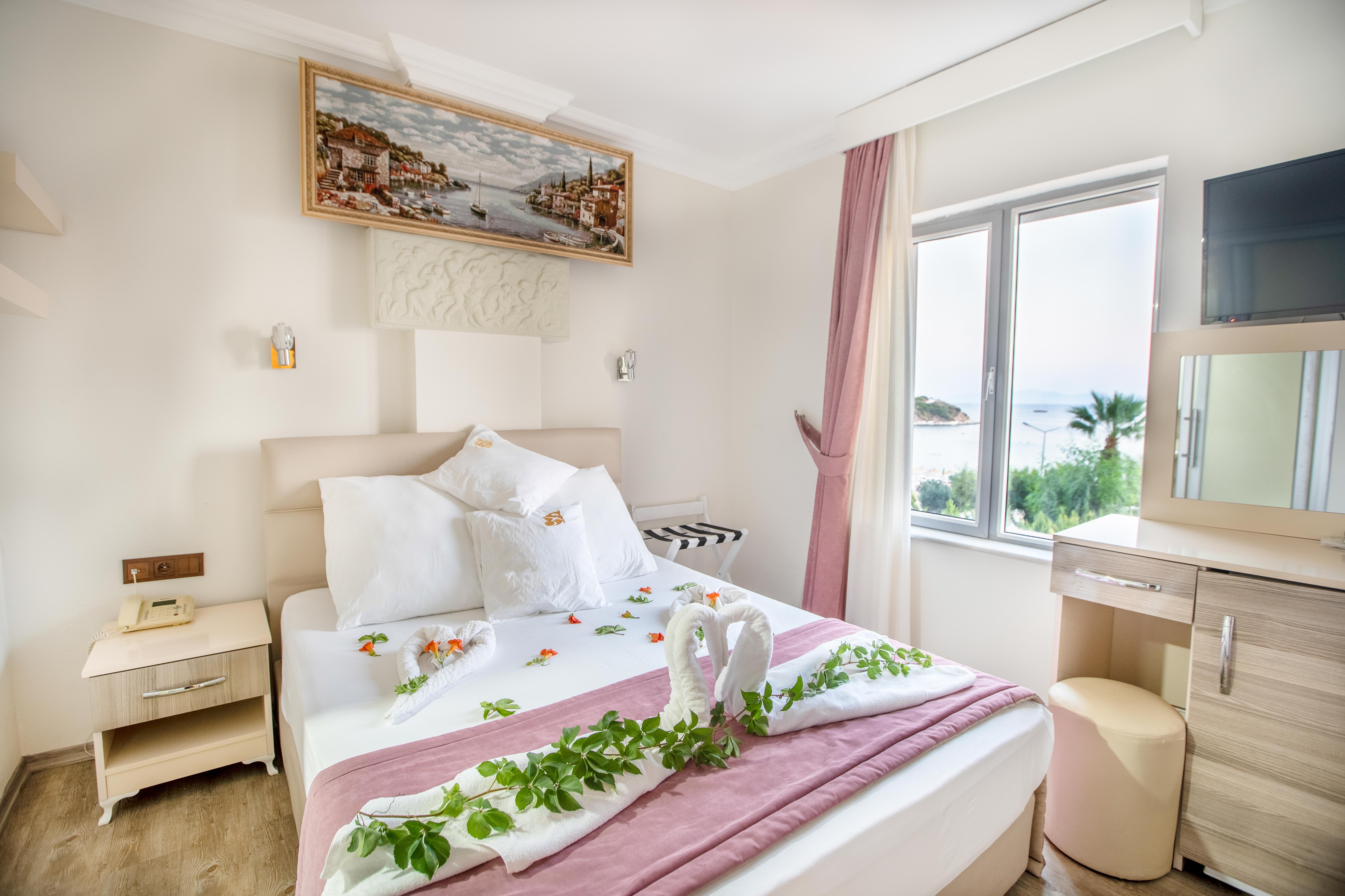 En fazla 3 yetişkin veya 2 yetişkin + 2 çocuk.