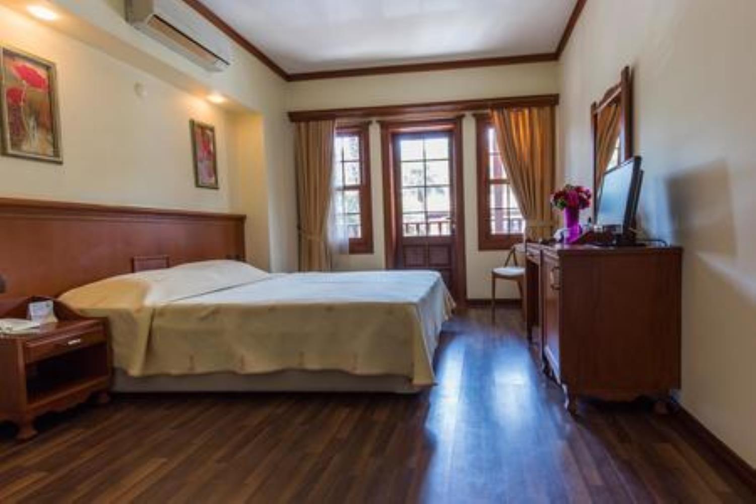 En fazla 2 yetişkin.