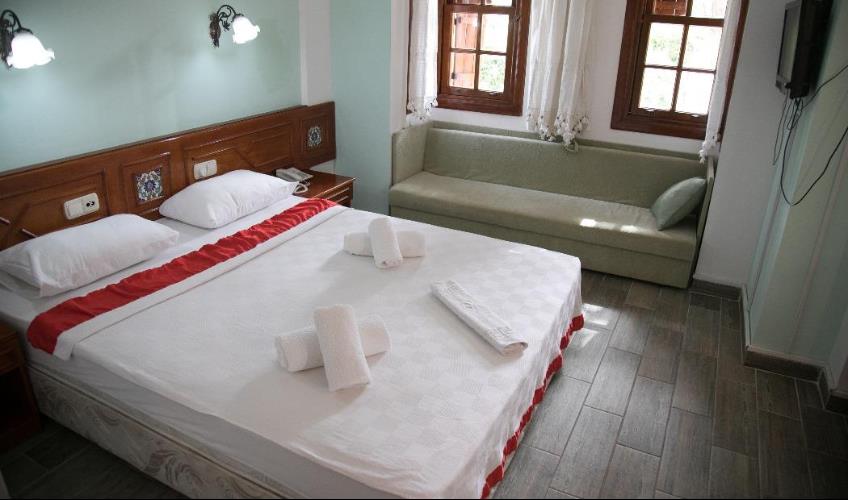 En fazla 3 yetişkin veya 2 yetişkin + 1 çocuk.