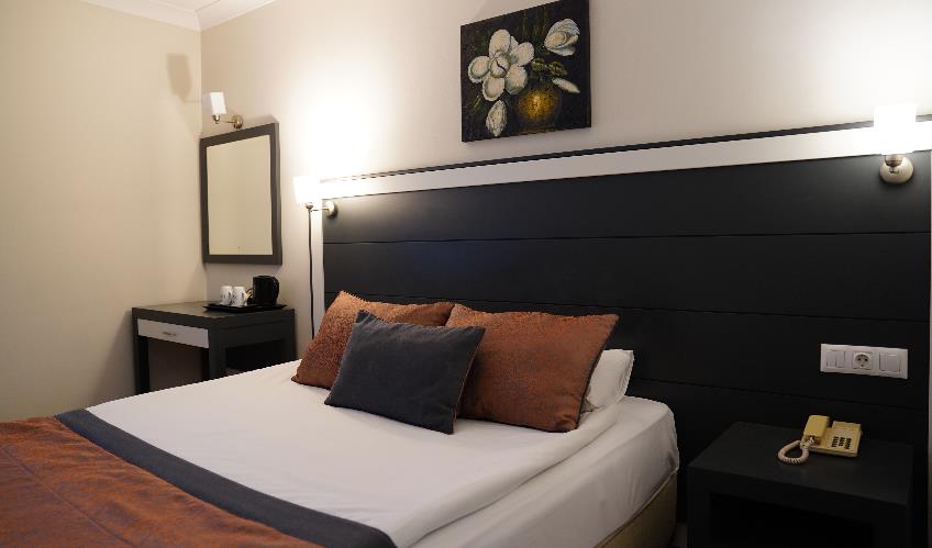 En fazla 2 yetişkin.