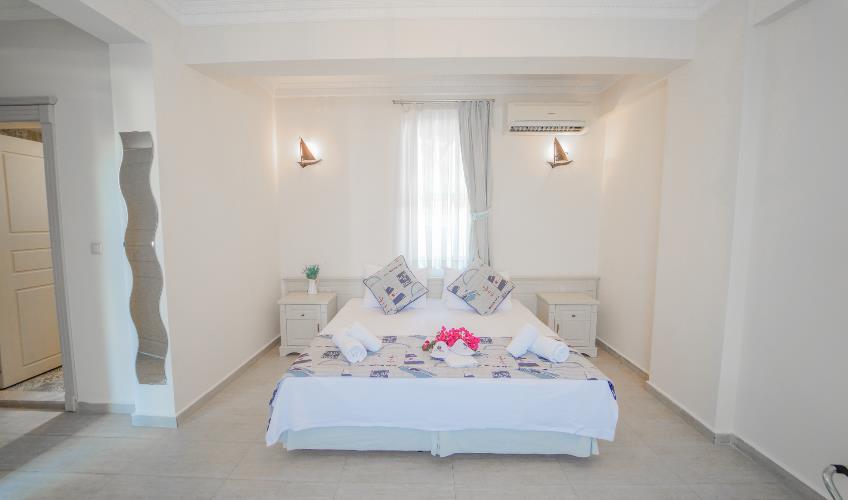 En fazla 3 yetişkin veya 2 yetişkin + 1 çocuk.