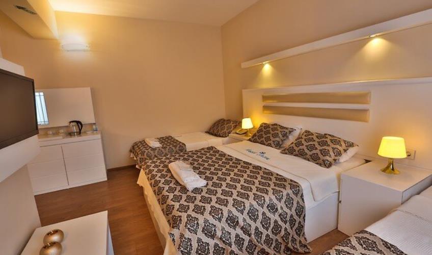 En fazla 4 yetişkin veya 3 yetişkin + 1 çocuk.