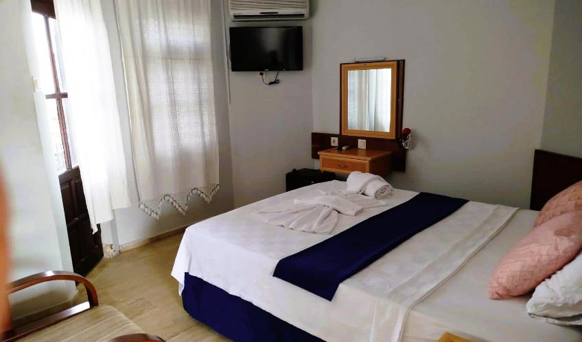 En fazla 1 yetişkin.