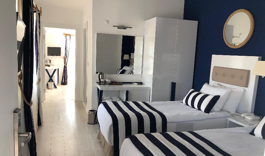 En fazla 4 yetişkin + 1 bebek (0-2 yaş) veya 3 yetişkin + 1 çocuk + 1 bebek (0-2 yaş).