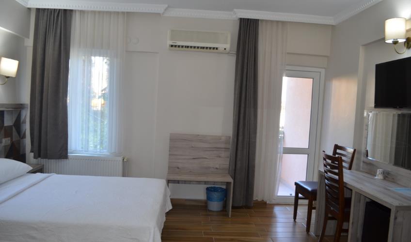 En fazla 1 yetişkin.