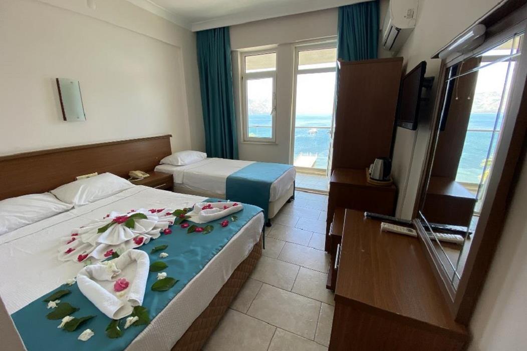 En fazla 3 yetişkin veya 2 yetişkin + 1 çocuk.