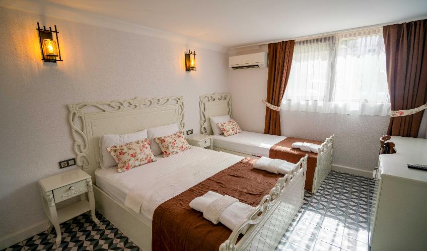 En fazla 3 yetişkin.