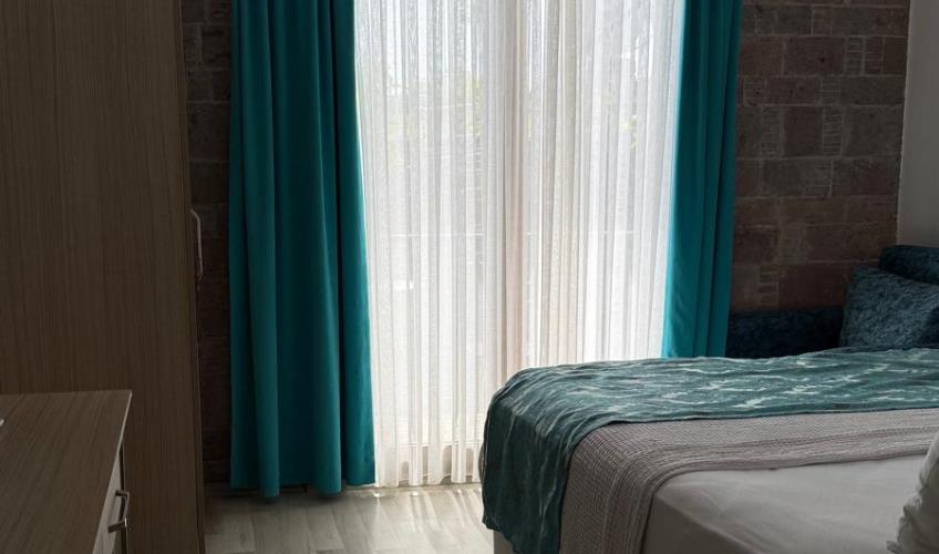 En fazla 2 yetişkin.