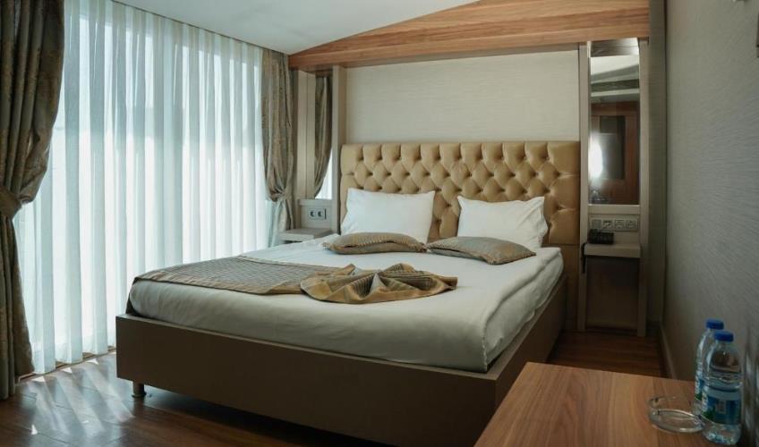 En fazla 1 yetişkin.