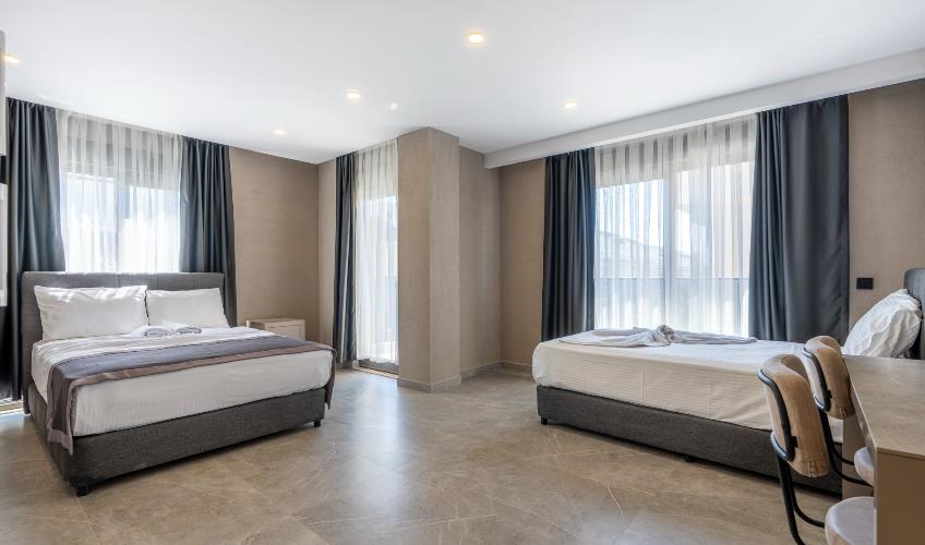 En az 4 yetişkin, En fazla 7 yetişkin + 1 bebek (0-2 yaş).