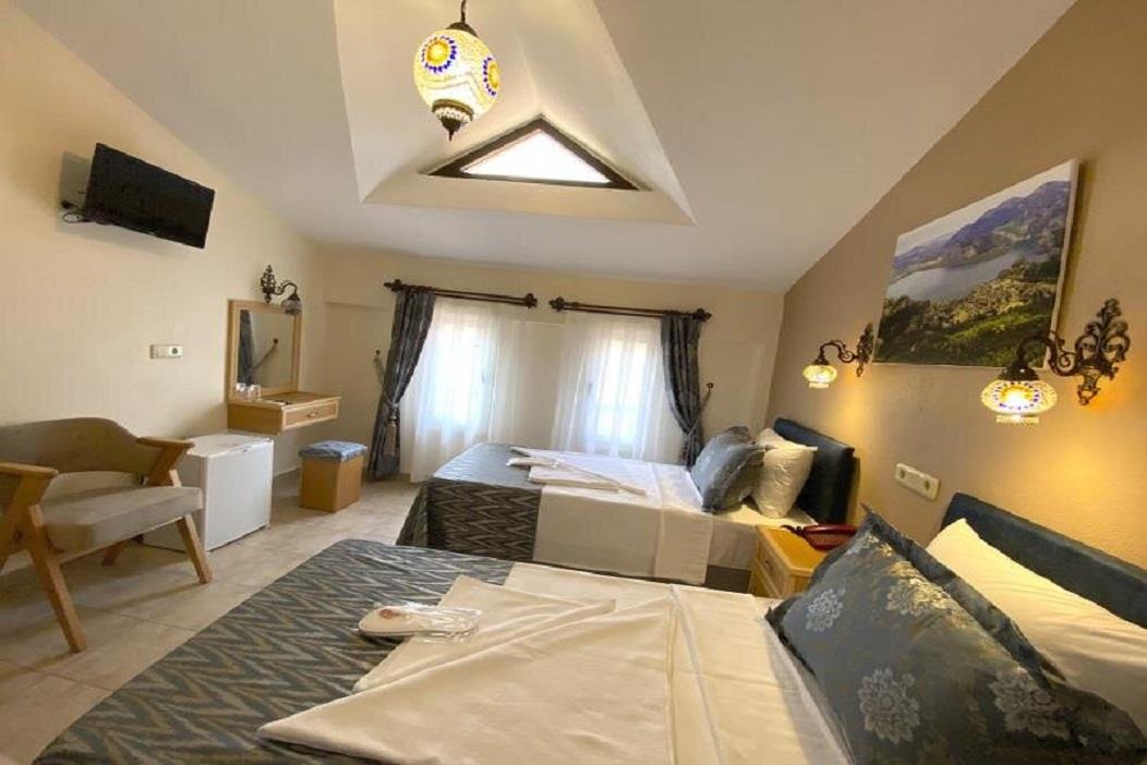 En fazla 1 yetişkin.