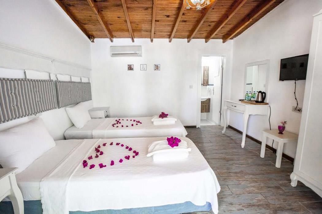 En fazla 2 yetişkin.