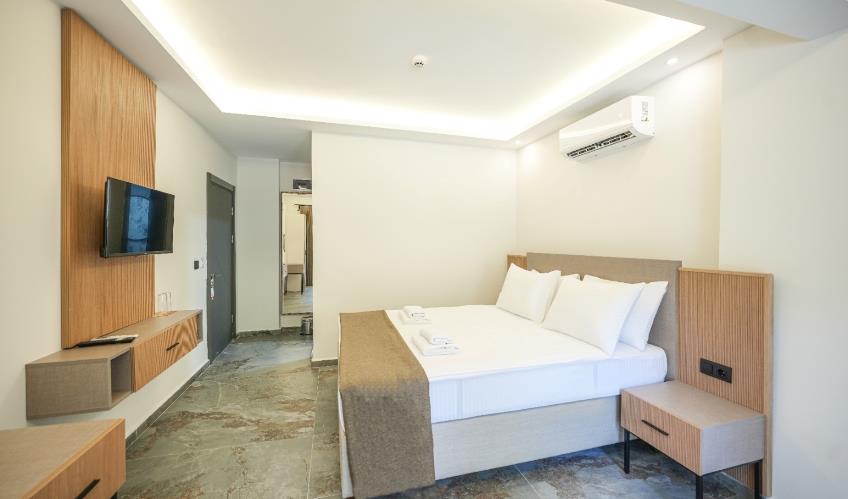 En fazla 3 yetişkin veya 2 yetişkin + 1 çocuk.