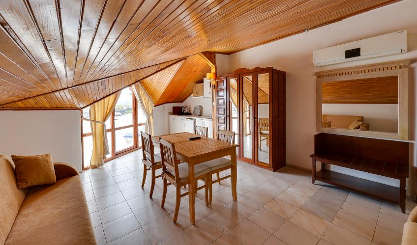 En fazla 4 yetişkin + 2 çocuk + 1 bebek (0-2 yaş) veya 3 yetişkin + 2 çocuk + 1 bebek (0-2 yaş).