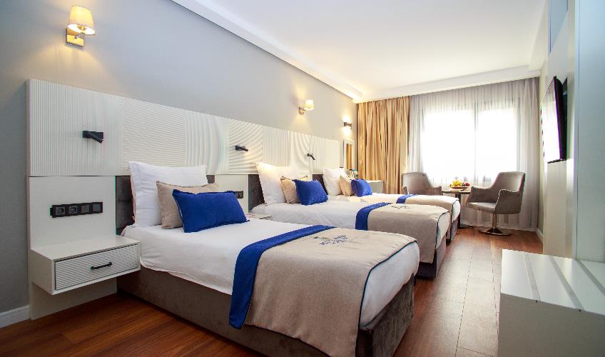 En fazla 3 yetişkin veya 2 yetişkin + 1 çocuk.