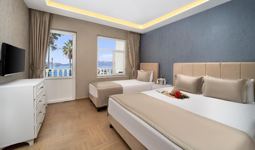 En fazla 3 yetişkin veya 2 yetişkin + 1 çocuk.