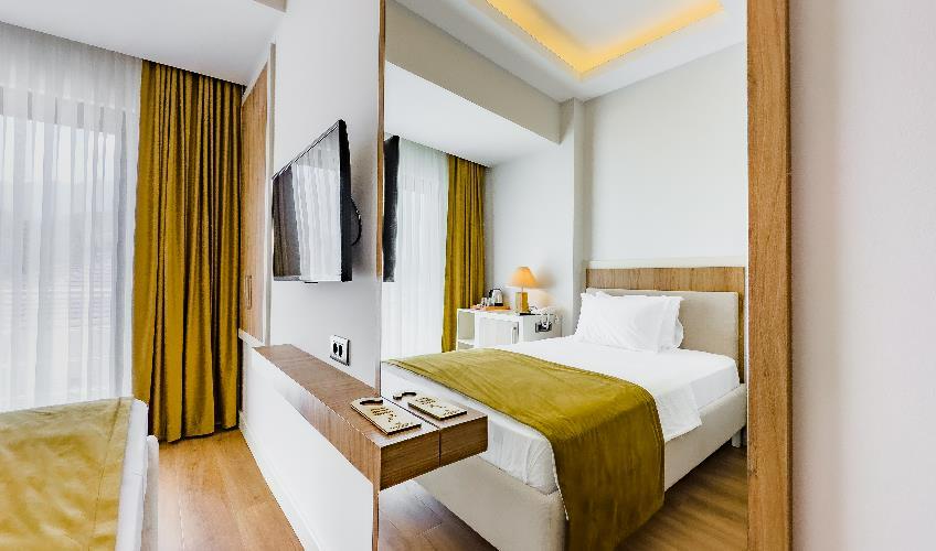 En fazla 1 yetişkin.