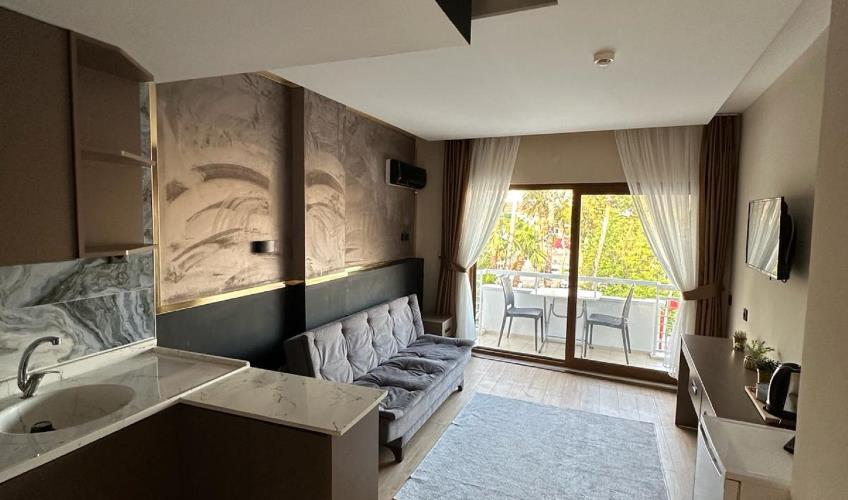 En az 2 yetişkin, En fazla 2 yetişkin + 1 bebek (0-2 yaş).