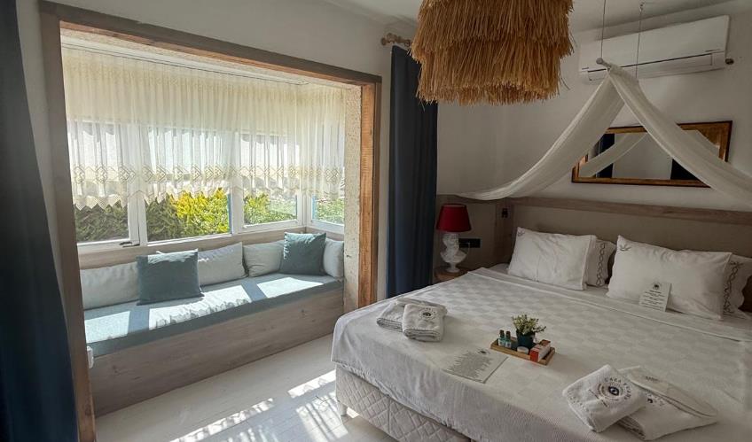 En fazla 3 yetişkin veya 2 yetişkin + 1 çocuk.