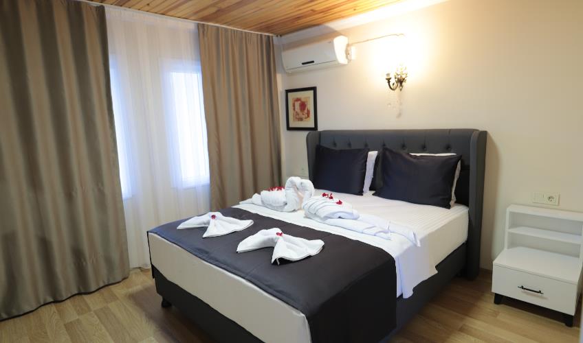 En fazla 2 yetişkin.