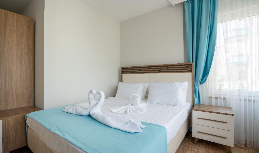 En fazla 4 yetişkin + 2 çocuk + 1 bebek (0-2 yaş) veya 3 yetişkin + 2 çocuk + 1 bebek (0-2 yaş).