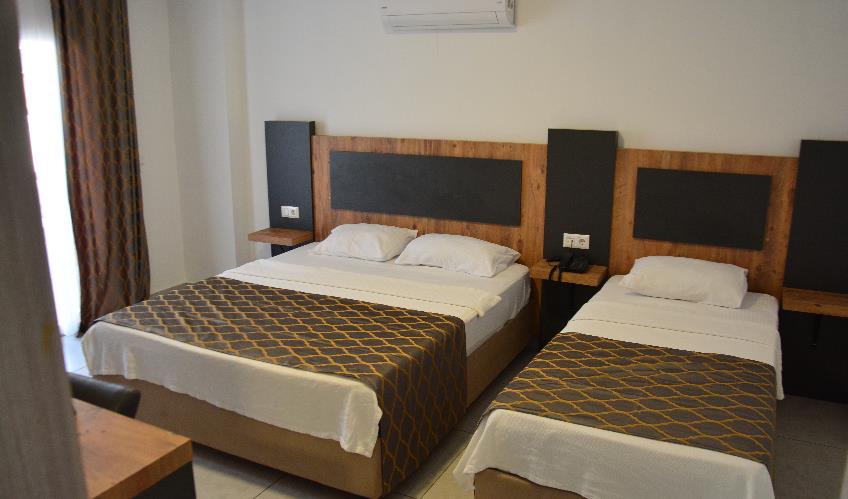 En fazla 3 yetişkin.