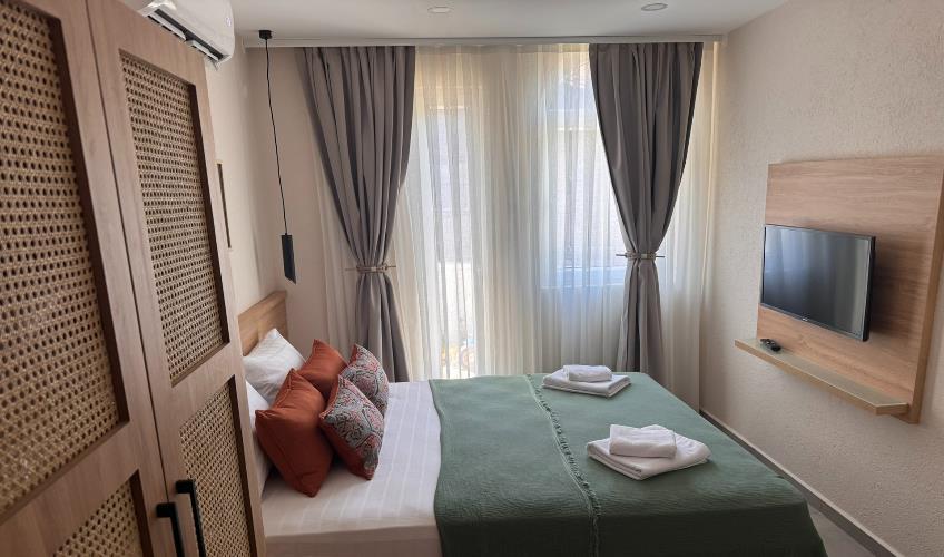 En fazla 2 yetişkin.