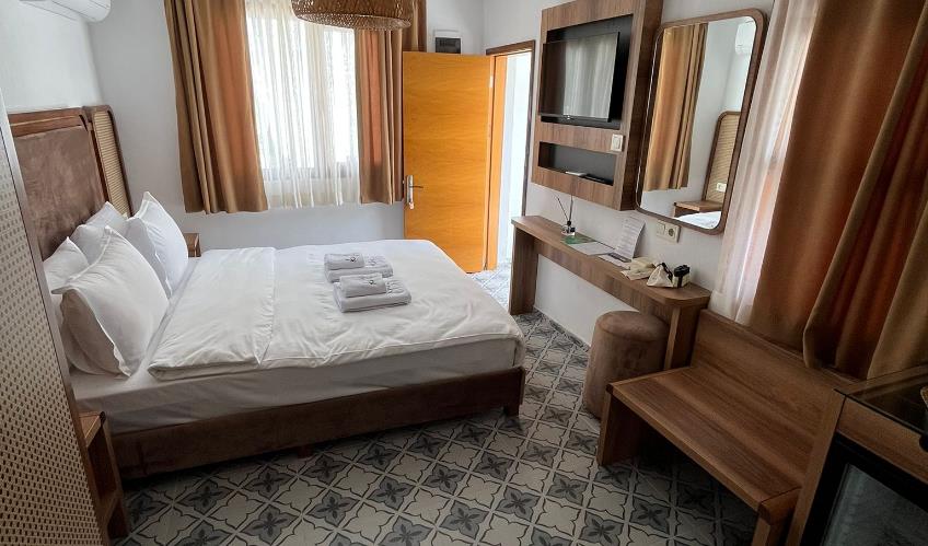 En fazla 2 yetişkin.