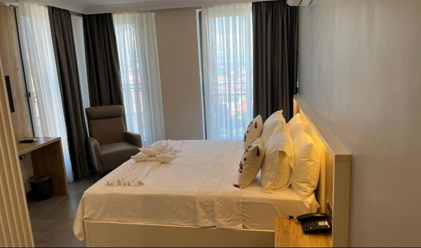 En fazla 2 yetişkin.