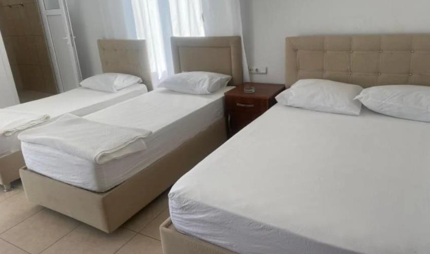 En fazla 3 yetişkin + 1 bebek (0-2 yaş).