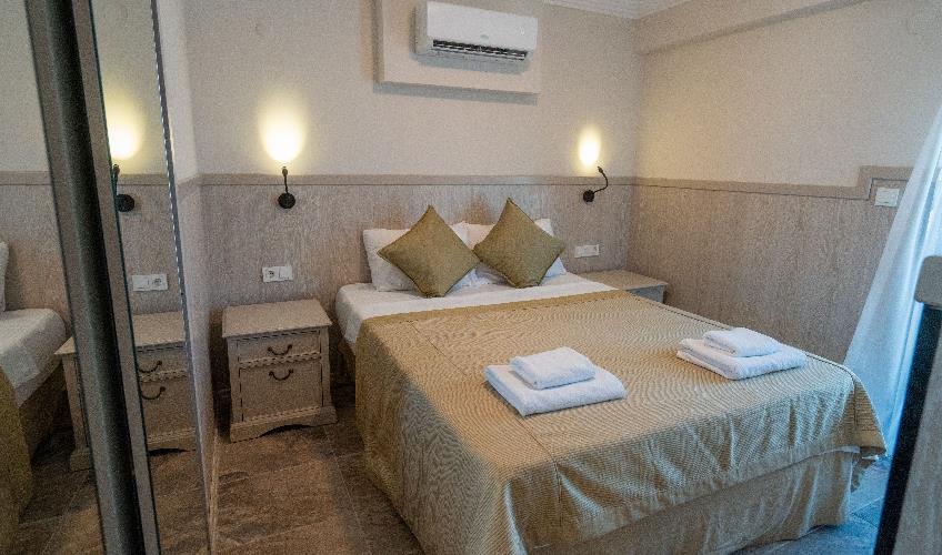 En fazla 4 yetişkin + 2 çocuk + 1 bebek (0-2 yaş) veya 3 yetişkin + 2 çocuk + 1 bebek (0-2 yaş).