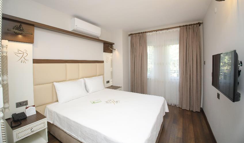 En fazla 2 yetişkin.