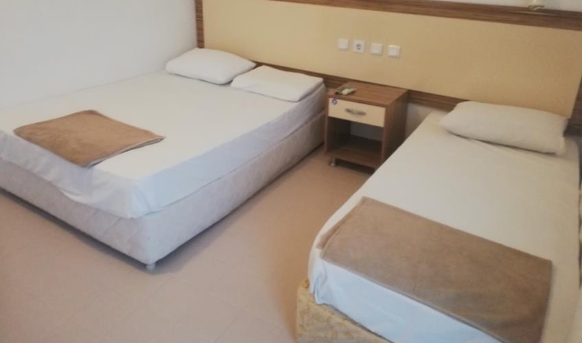 En fazla 3 yetişkin + 2 çocuk + 1 bebek (0-2 yaş) veya 2 yetişkin + 2 çocuk + 1 bebek (0-2 yaş).