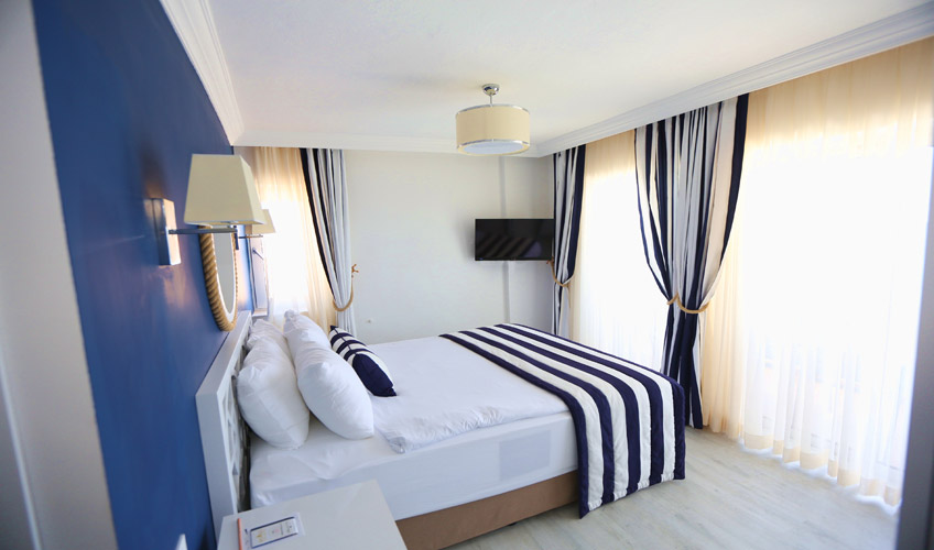 En fazla 4 yetişkin + 1 bebek (0-2 yaş) veya 3 yetişkin + 1 çocuk + 1 bebek (0-2 yaş).